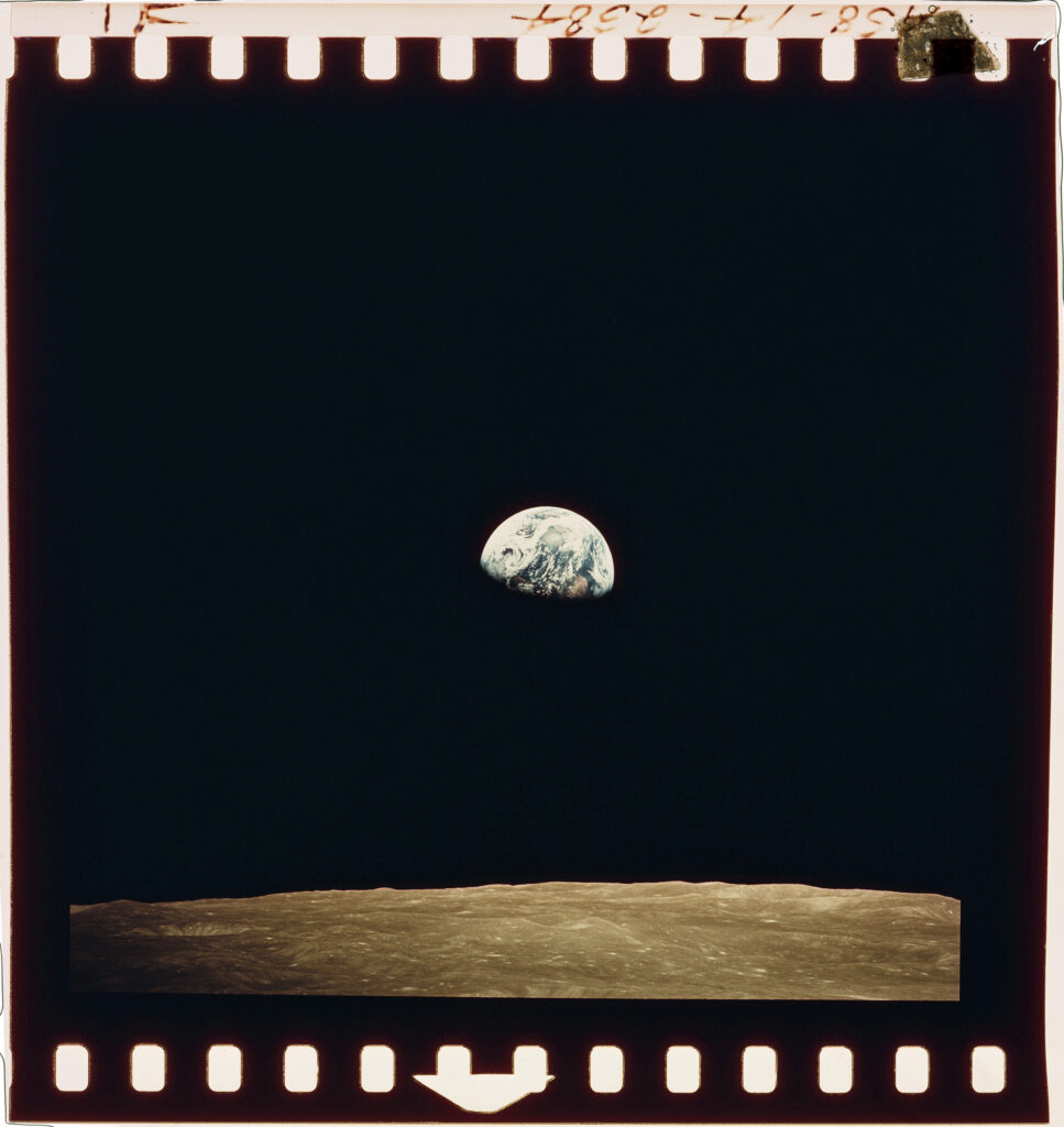 A view of the Earth beyond the lunar horizon, photographed by Apollo 8 astronaut Bill Anders while orbiting the moon on December 24, 1968. © Space Frontiers/Getty
